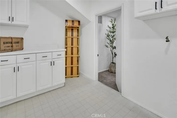 Laundry room with storage