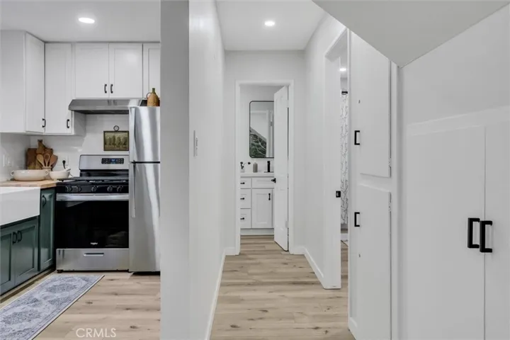 Hallway leading to main bedroom and bathroom