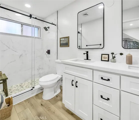 Updated bathroom with walk in shower