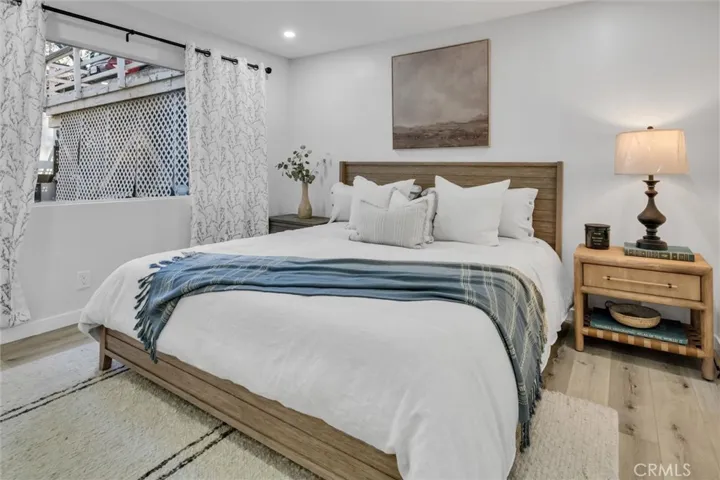 Main level bedroom with views of forest