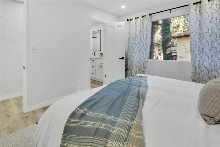 Main level bedroom with access to bathroom