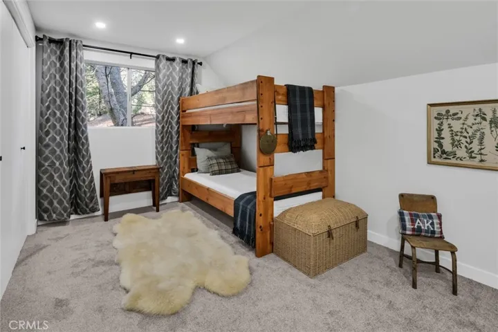 Upstairs guest bedroom with views