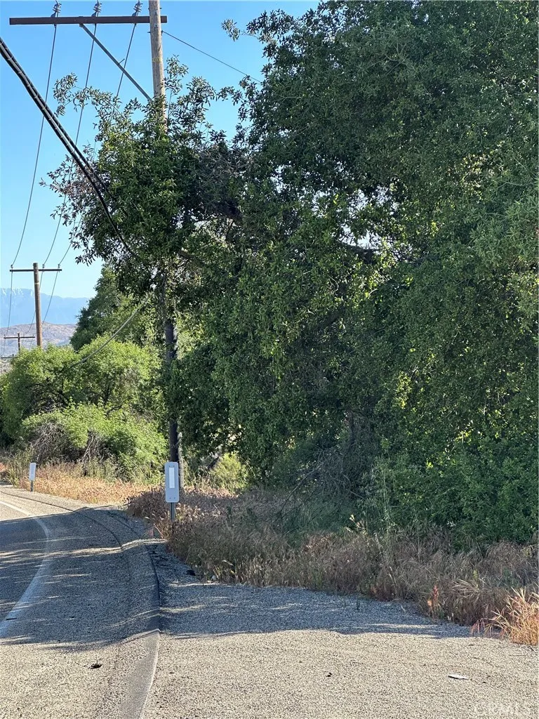 Sage Road in front of parcel.