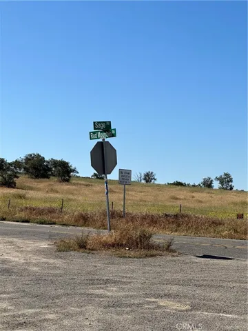 Corner of Sage & Red Mountain Roads next to parcel.