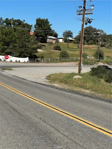 Corner of Sage Rd & Red Mountain Road in front of parcels.
