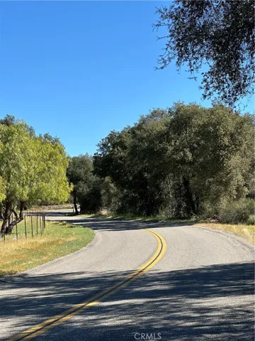 Red Mountain Road in front of parcels, view of lake.