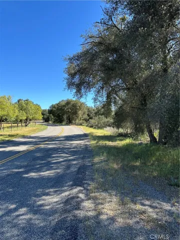 Red Mountain Road in front of parcels.