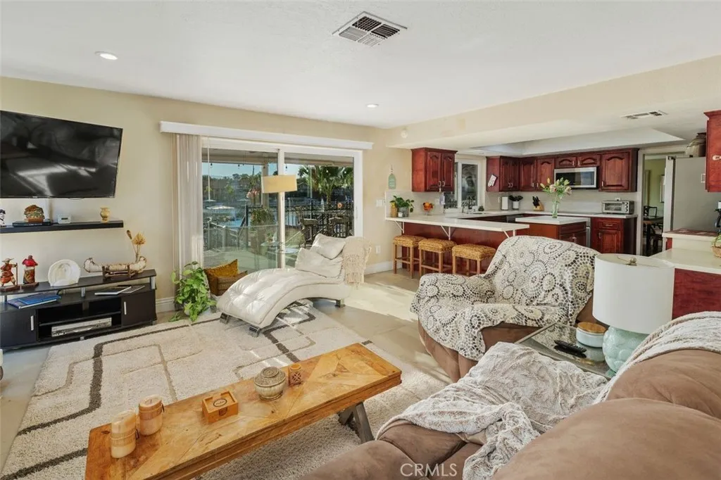Family Room/Slider to Deck/ Kitchen