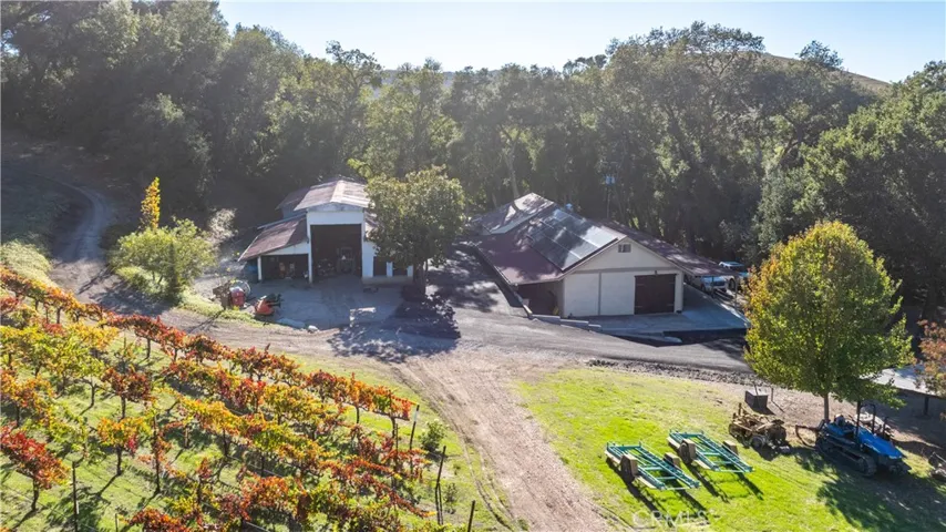 Property boasts great outbuildings.