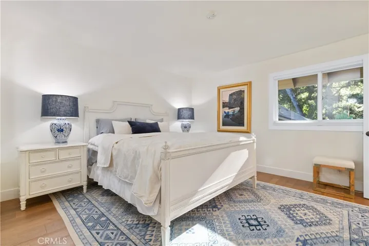 Transitioning into the second bedroom, offering comfort, versatility, and inviting natural light.