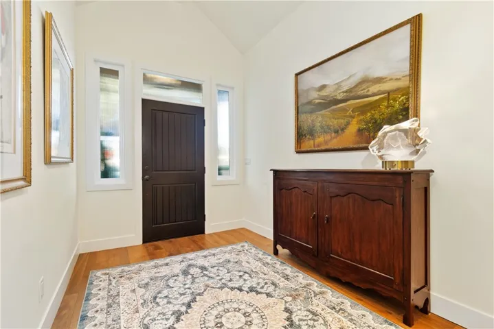 Spacious foyer offering a warm and inviting introduction to the home’s interior.