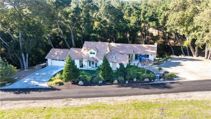 Overhead view highlighting the main residence and its scenic setting.