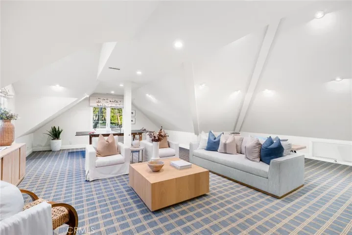 Converted attic bonus room with adjacent powder bathroom