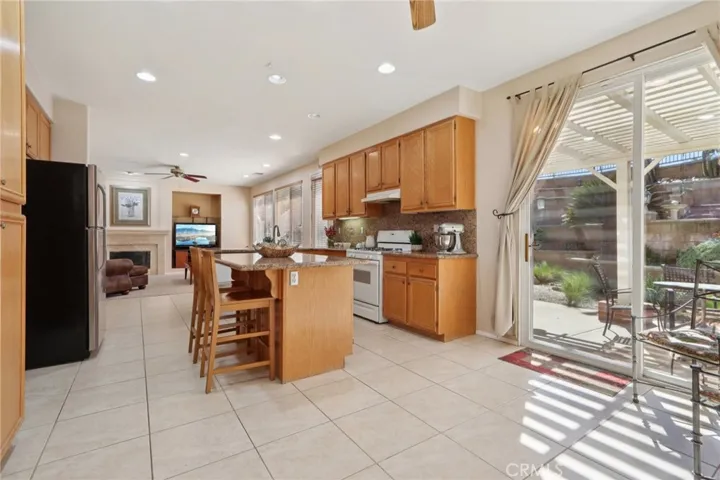 Spacious kitchen with direct access to the backyard patio