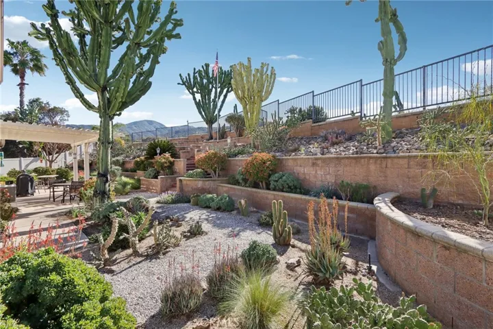 Tiered backyard with drought-tolerant landscaping