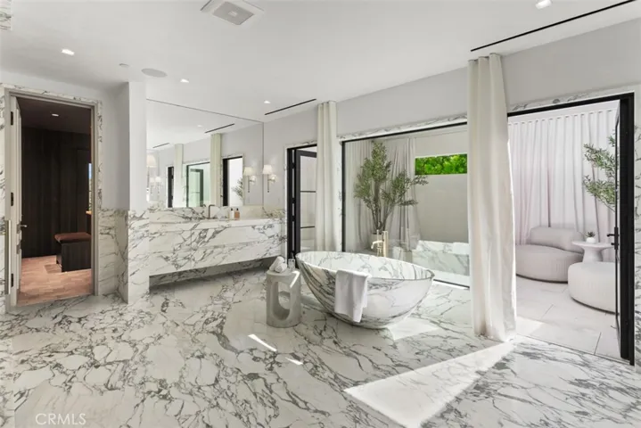 Primary bath with dual oversized closets