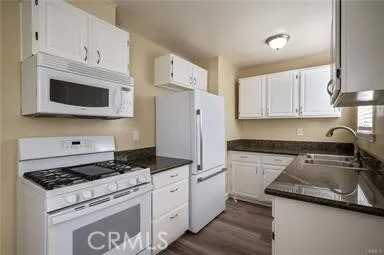Beautifully updated kitchens with newer appliances and granite counter tops.