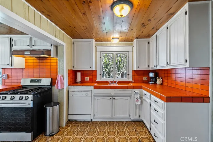 Ample cabinetry and countertop space make preparing meals a breeze.