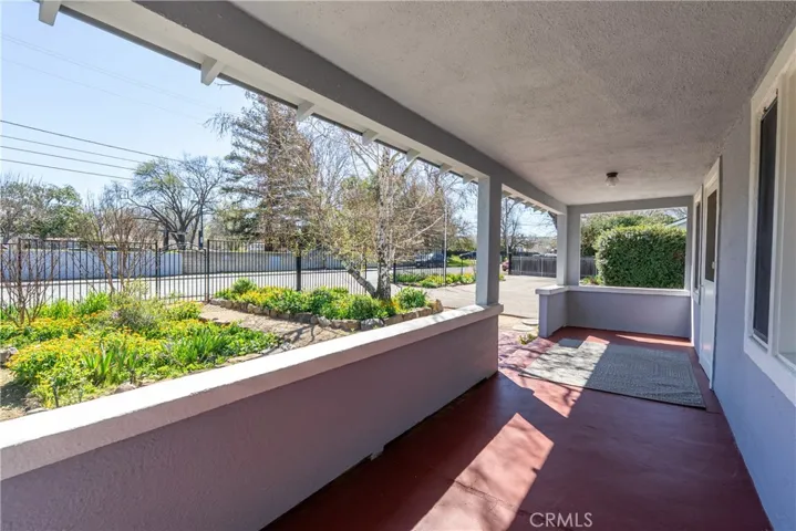 The covered front porch offers a wonderful spot to greet guests or have a cup of coffee.
