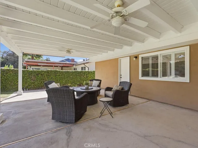 Covered patio in spacious rear yard