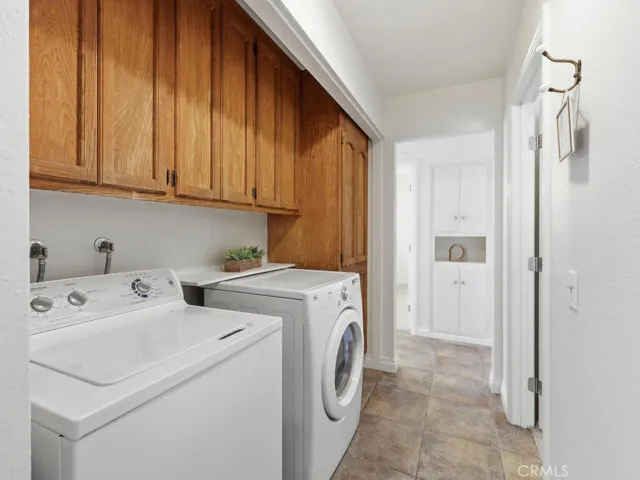 Laundry area and hall storage cabinets