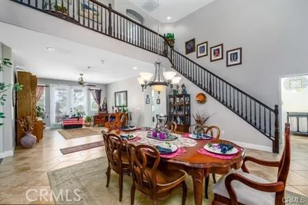 Dining Room with Dramatic Staircase