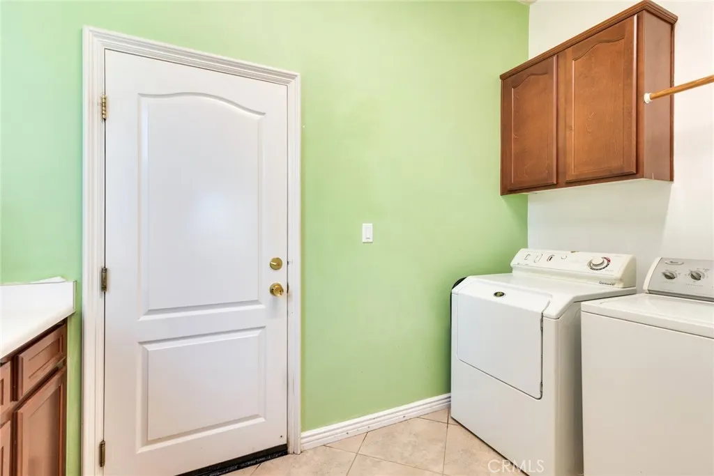 Interior Laundry Room includes clothes Washer & Dryer