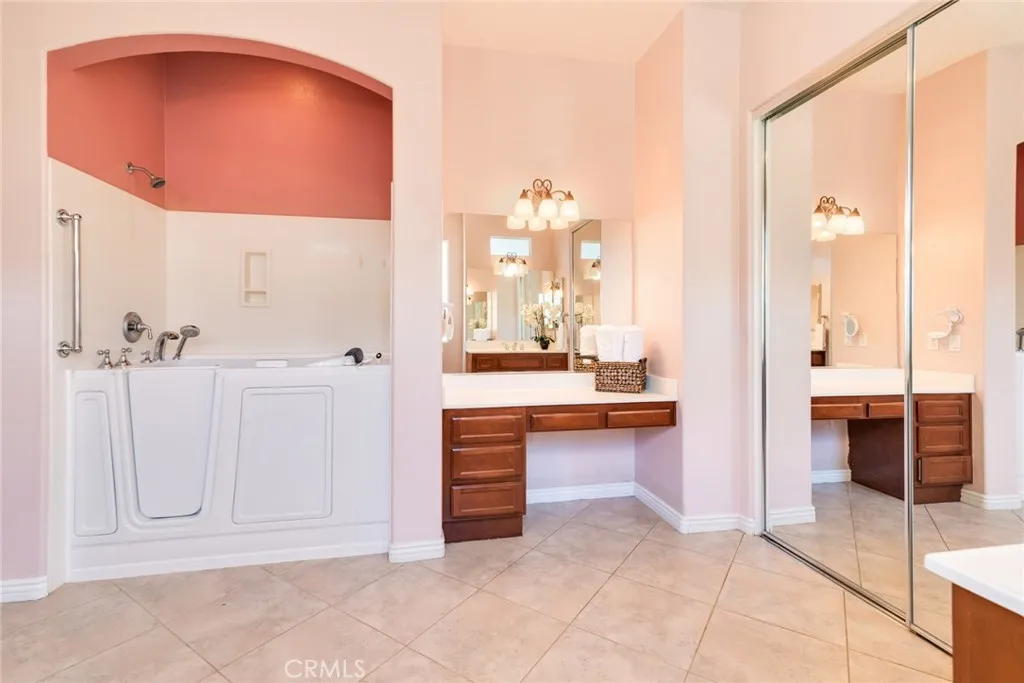 Relaxing Jacuzzi Tub and Walk-in Closet of MBath