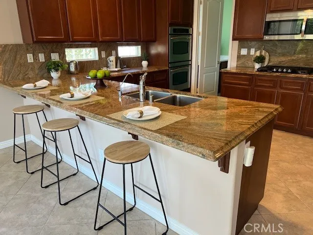 Spacious Kitchen Counter May Sit 3-4 Persons