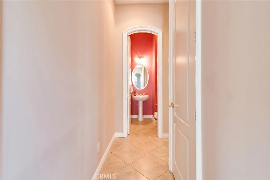 Powder Bath in Hallway toward Front Bedroom