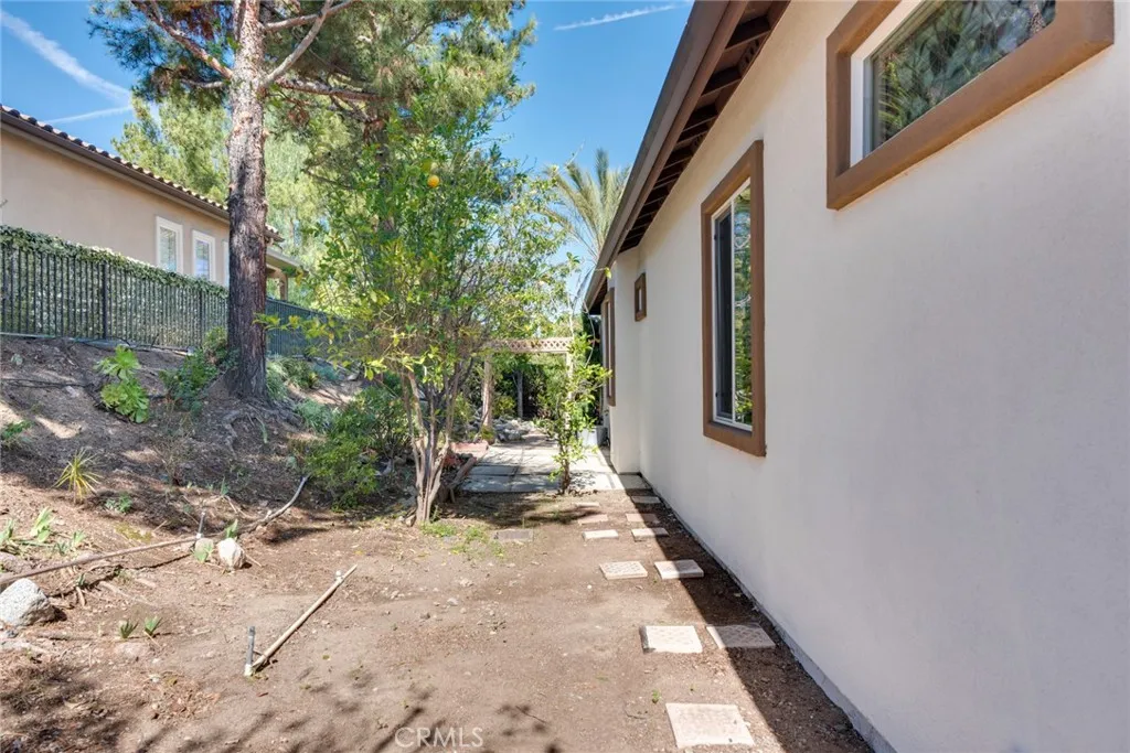 View of Side Yard from front of home; controlled by Automatic Sprinklers