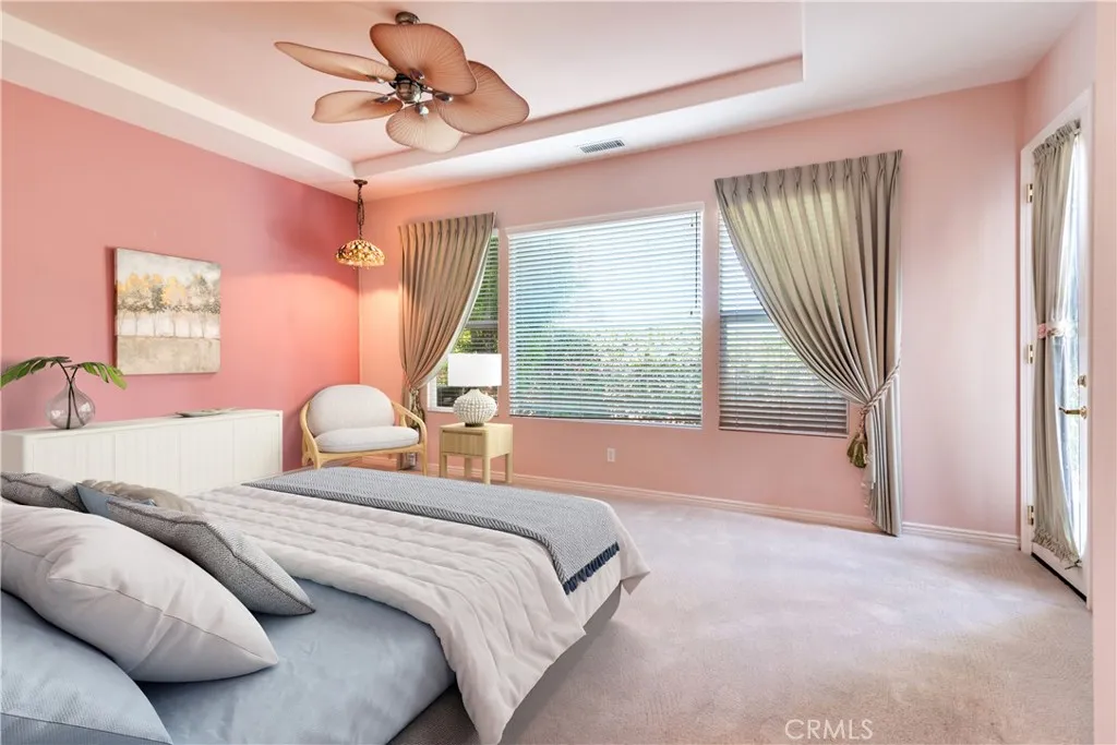 AI Staged Primary Bedroom is at rear of home