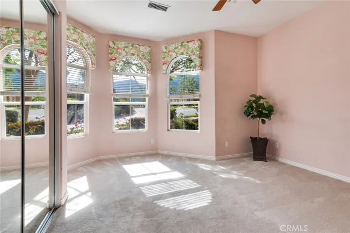 Spacious, bright, second Bedroom faces front of home ("as is" Photo)