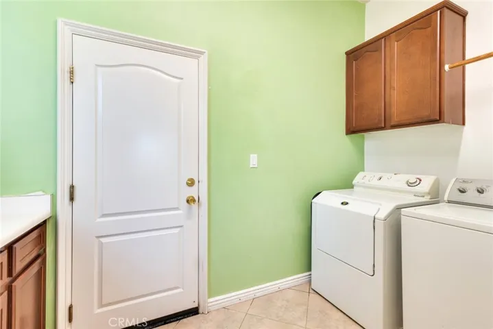 Interior Laundry Room includes clothes Washer & Dryer
