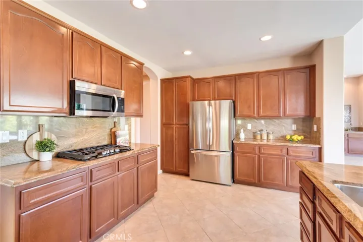 View toward included Fridge and Butler's Pantry. Pullout Drawers Galore