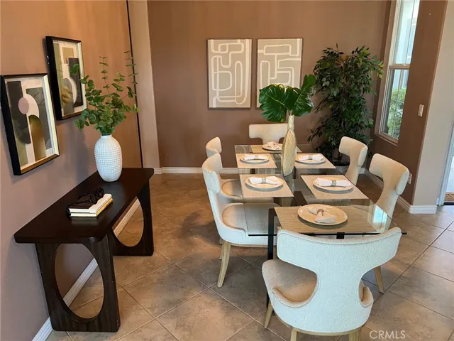 Formal Dining Area Welcomes You Upon Entering