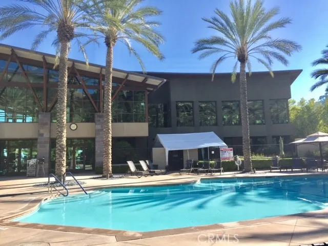 Delightful Outside Pool behind Sports Center Building