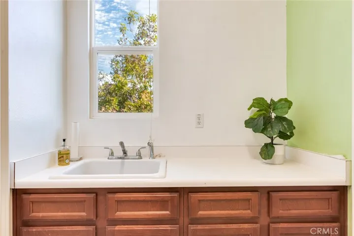 Cabinets and Sink in Laundry Room