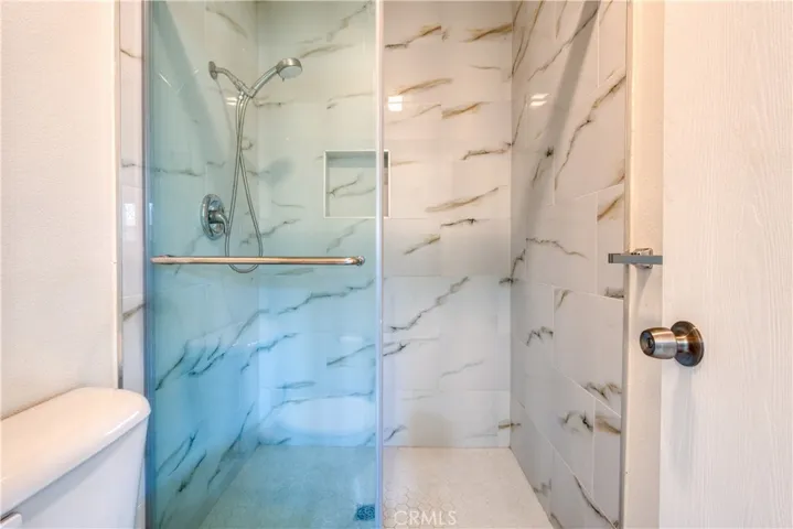 Primary bedroom dual walk-in shower