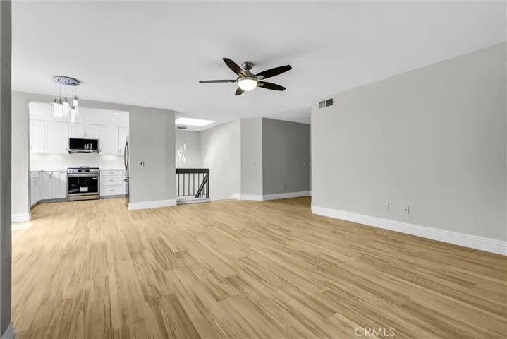 Dining area with new floorings, new chandelier and open to Kitchen area