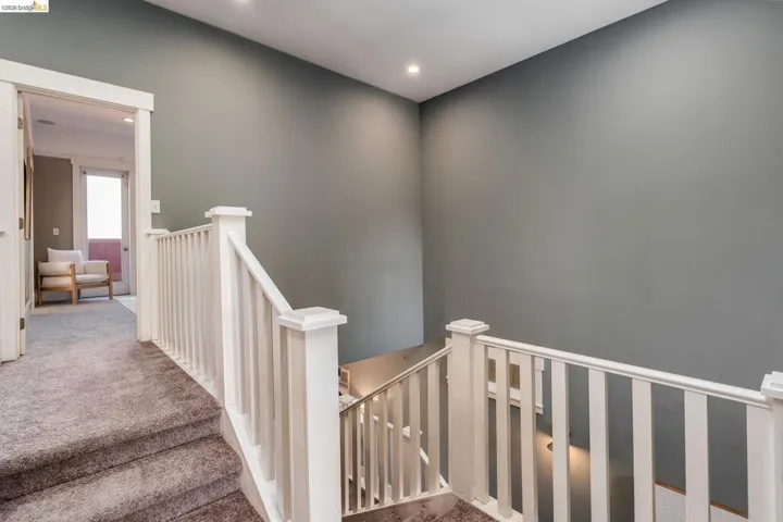 Stairs featuring carpet flooring and recessed lighting