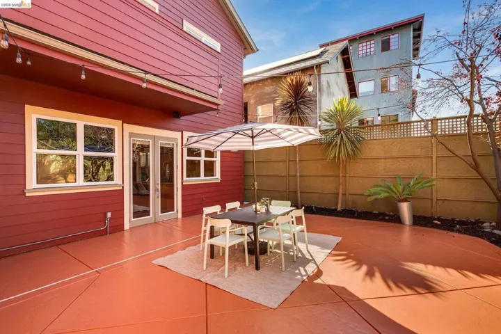 View of patio featuring outdoor dining area and french doors