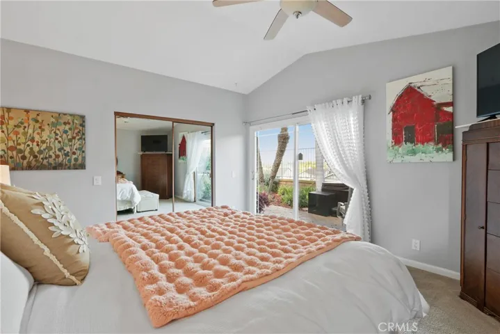 Master bedroom with sliding door to backyard
