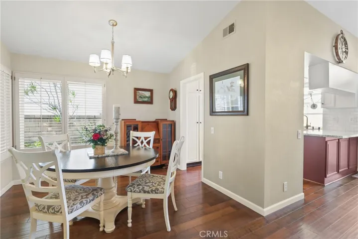 Dining room next to kitchen and open to family room