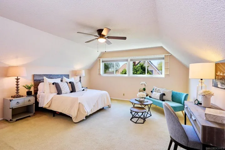 One of two loft-style, spacious bedrooms upstairs.