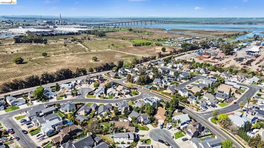 Aerial view of a notable bridge and a nearby body of water