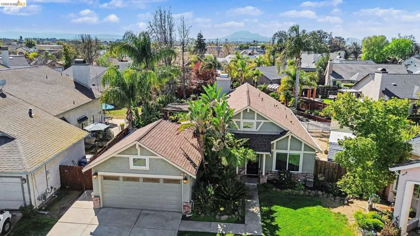 Aerial perspective of suburban area featuring mountains