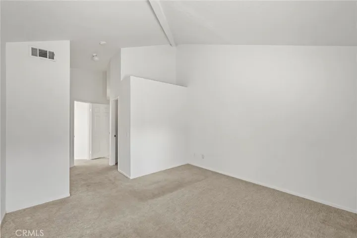 Upstairs on the right, overlooking the greenbelt is the Large Primary Suite