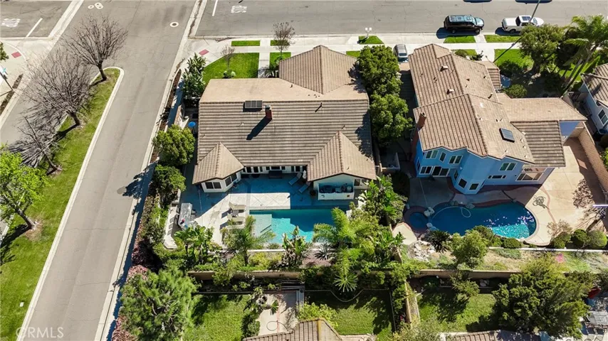 Sky view of home, lot and pool.