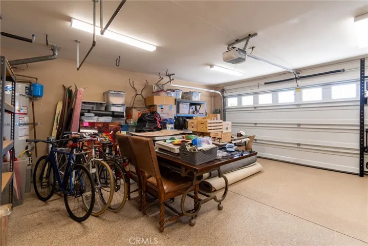 Garage is finished off with some shelving, lights and Epoxy Floor.